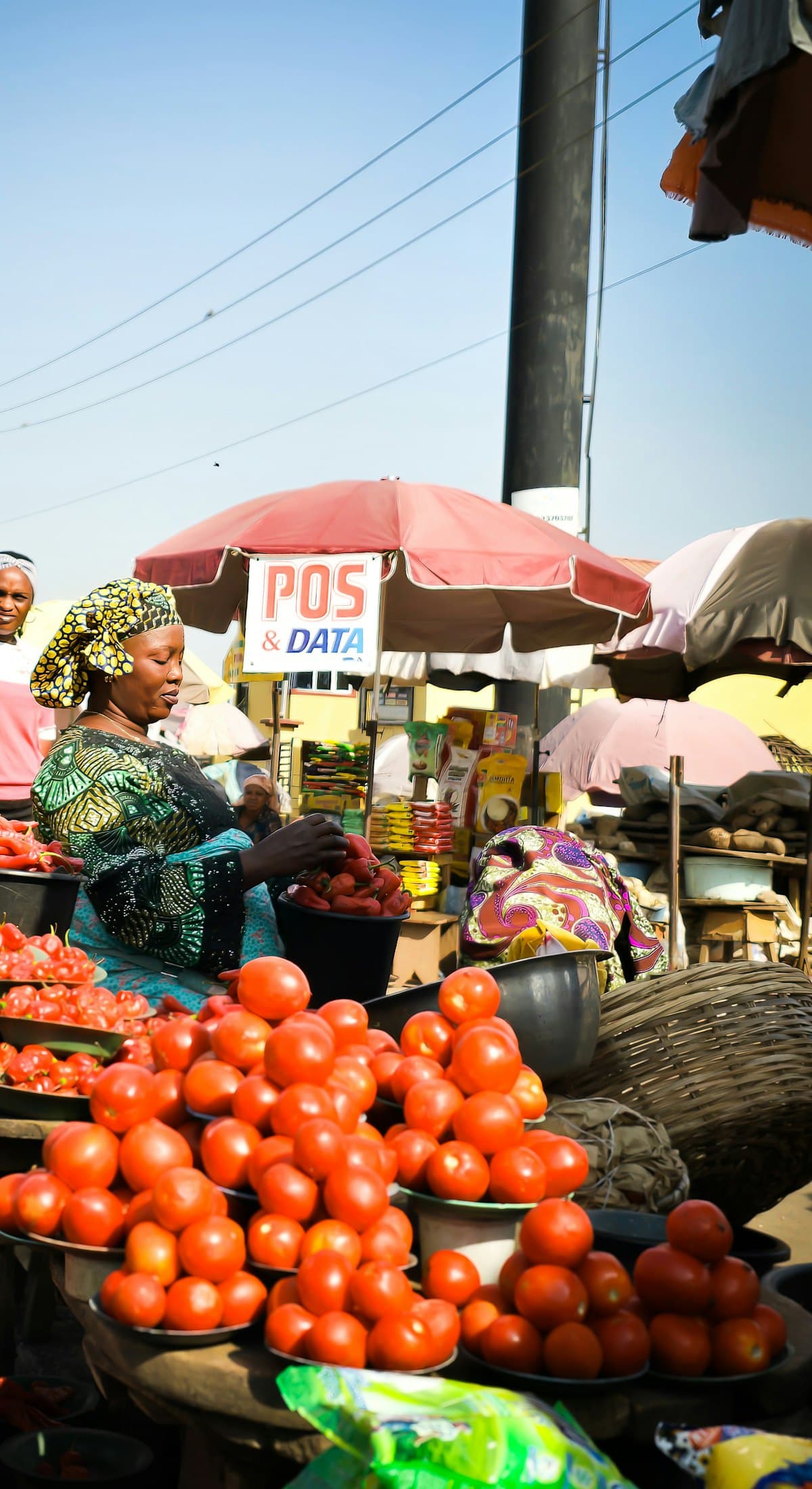 A trader at her stall in a Nigerian market